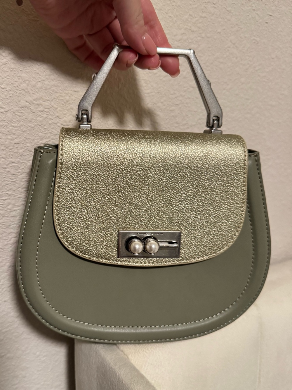 olive green and gold Charles & Keith saddle bag